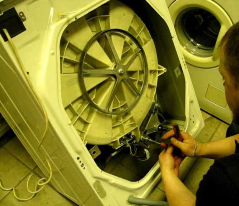 Как вытащить барабан из стиральной машины samsung?