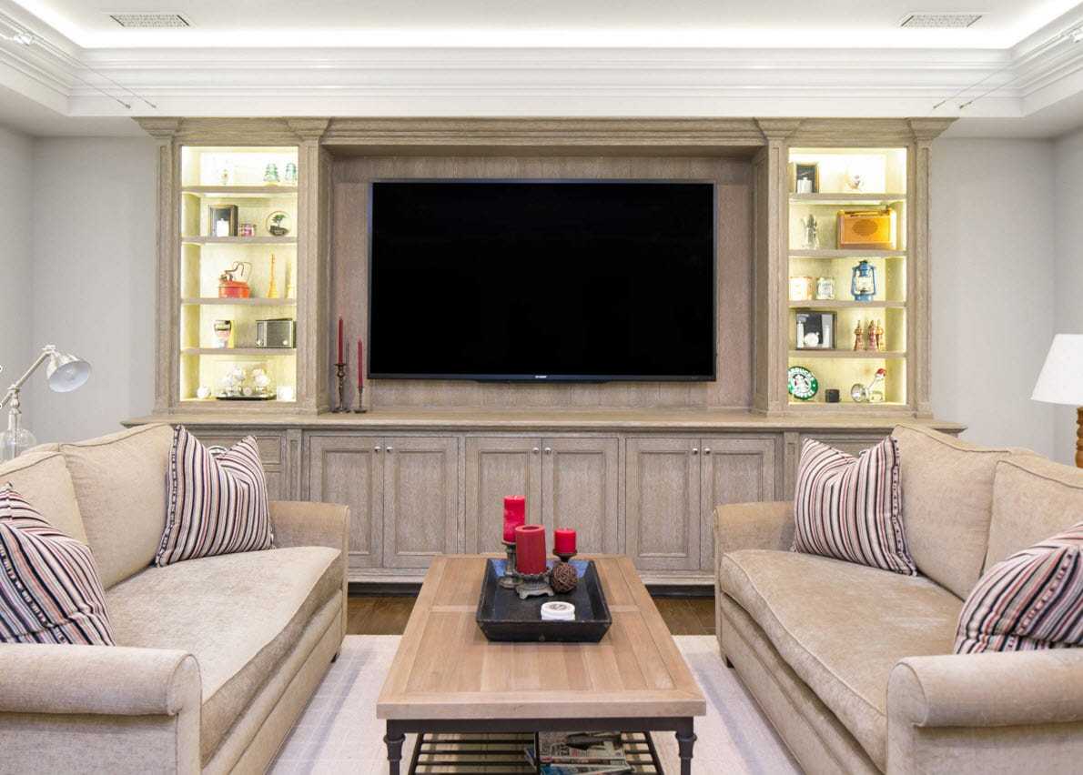 Телевизор на стене в гостиной: как оформить зону правильно и красиво